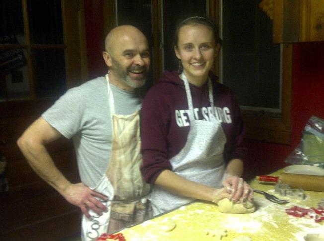 My dad and I kneading the dough (check out his apron...)